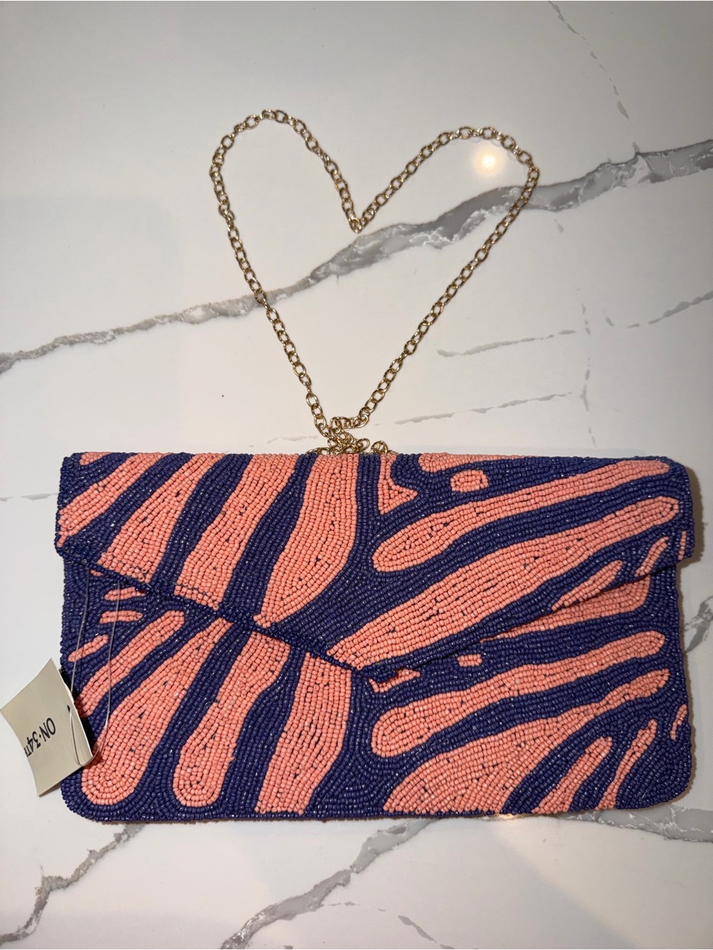 On 34th Hand Beaded Envelope Clutch in Coral and Navy